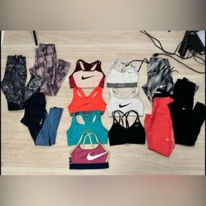 A bag of Nike bras and leggings